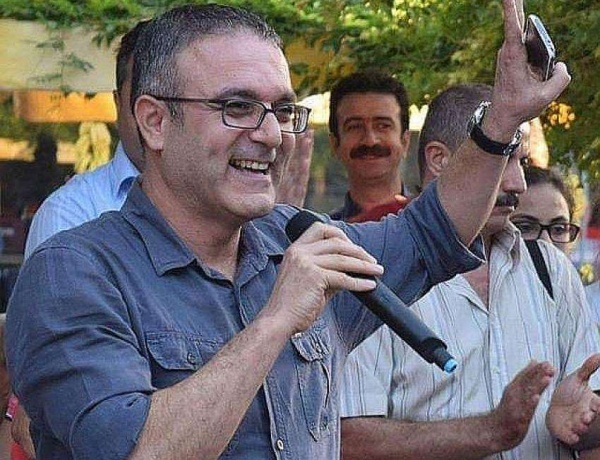 CÜNEYT KAYIKÇI DEVRİM VE DEMOKRASİ MÜCADELESİNDE YAŞAYACAKTIR